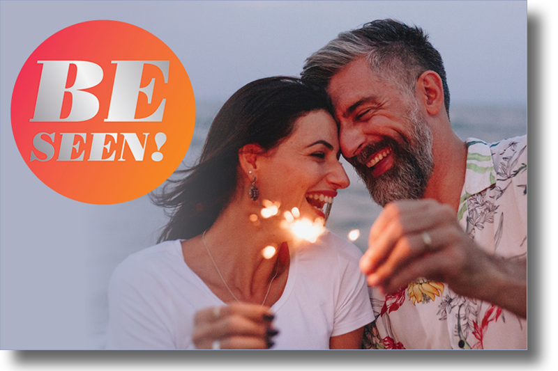 A photo of a man and woman laughing on a post card.