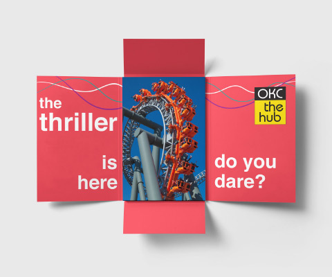 A four-panel fold out invite with a red inside that reads "the thriller is here. do you dare?" and an OKC the hub logo on the right. An image of a rollercoaster ride sits in the center.