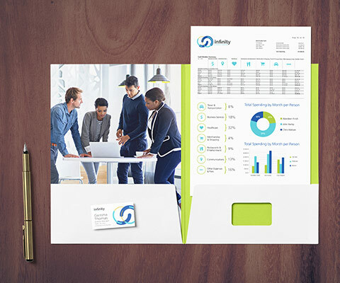 Open Infinity Credit Union folder with an image of a group of people looking at a computer on the left inside of the folder and a bank statement document in the right.